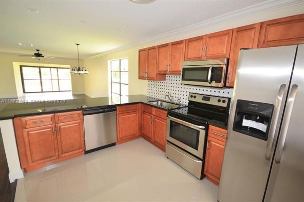Photo of 7944 Eastlake Dr #D, Boca Raton, FL 33433 (MLS # A11982763)