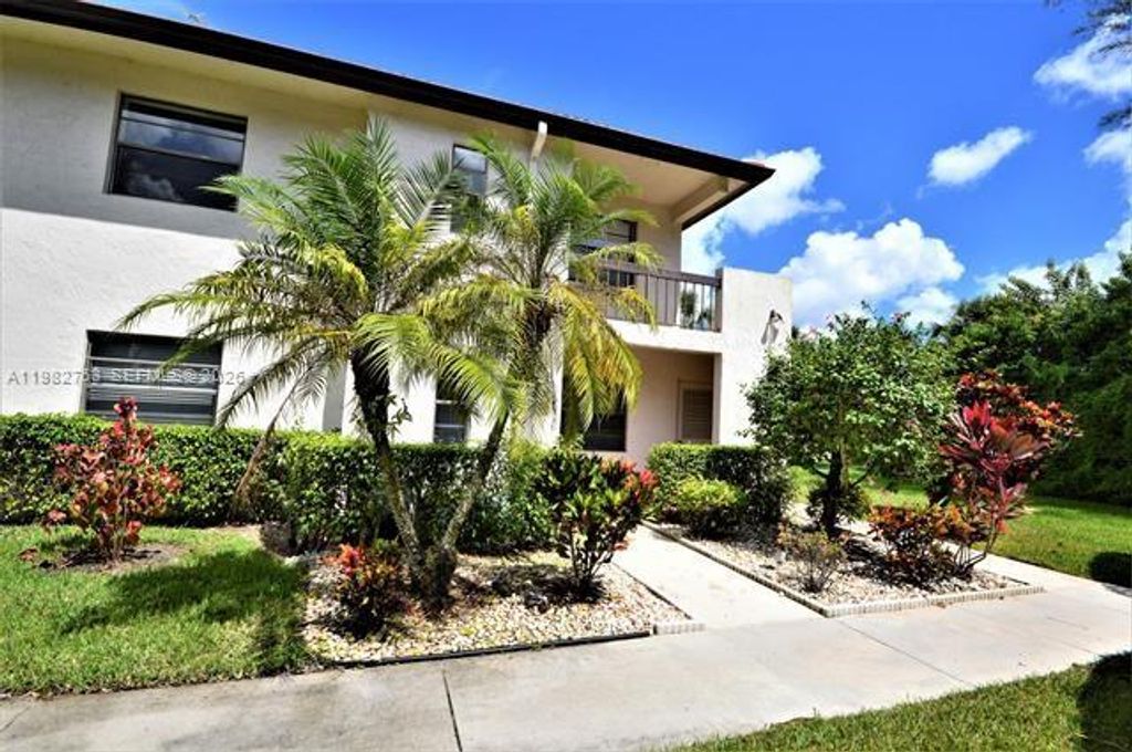 Photo of 7944 Eastlake Dr #D, Boca Raton, FL 33433 (MLS # A11982763)