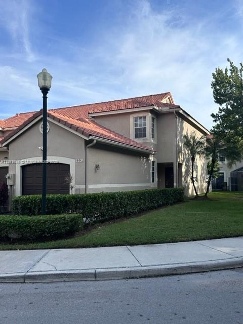 * BEATIFUL 2 BEDROOMS, 2.5 BATHROOMS TOWNHOME IN SAN REMO, A GATED COMMUNITY IN WESTON * CORNER UNIT WITH OPEN PLAN WITH LOTS OF LIGHT * GARAGE AND SCREENED PATIO * LAMINATE FLOOR IN BEDROOMS, TILE ON DIAGONAL DOWNSTAIR * HURRICANE SHUTTERS IN GROUND AND SECOND FLOOR * FAMILY ORIENTED COMMUNITY WITH GREAT SCHOOLS NEARBY *