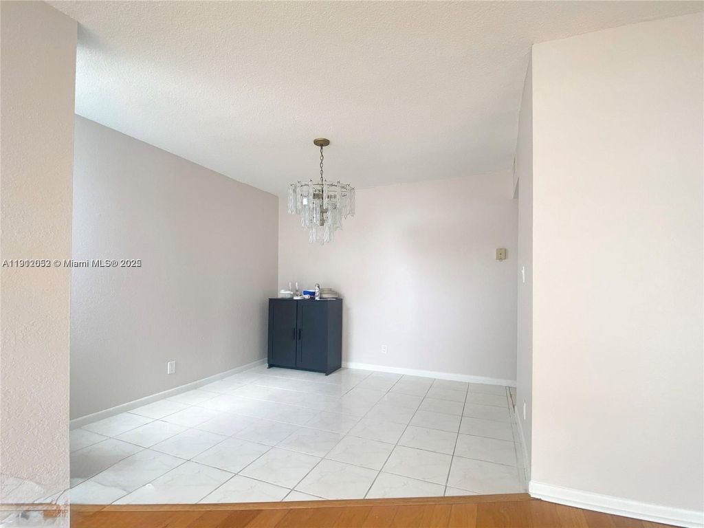 Photo of 430 Golden Isles Dr #701, Hallandale Beach, FL 33009 (MLS # A11912052)