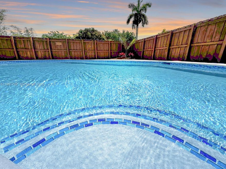 This single family home is located in the Hollywood Hills area and has 3 bedrooms and 2 bathrooms, along with an additional enclosed room that may be used as a 4th bedroom, office, or flex space. The home has been fully remolded and updated with a new kitchen featuring white cabinetry, gold tone hardware, stainless steel appliances, Taj Mahal countertops and a large island. Interior features include new wood style laminate flooring, updated bathrooms, and fresh interior and exterior paint. French doors lead to the patio and pool area, creating a bright and open connection to the outdoor space. The pool has been resurfaced and the pool deck has been updated, for a great backyard to enjoy. Additional features include a new washer and dryer and a circular driveway. All bedrooms, including the primary bedroom have direct patio and pool access with access to the backyard, a walk in closet, and an updated bathroom that will leave you feeling like you are at the spa. No HOA and convenient access to shopping, dining, parks, and is approximately six miles from Hollywood Beach.