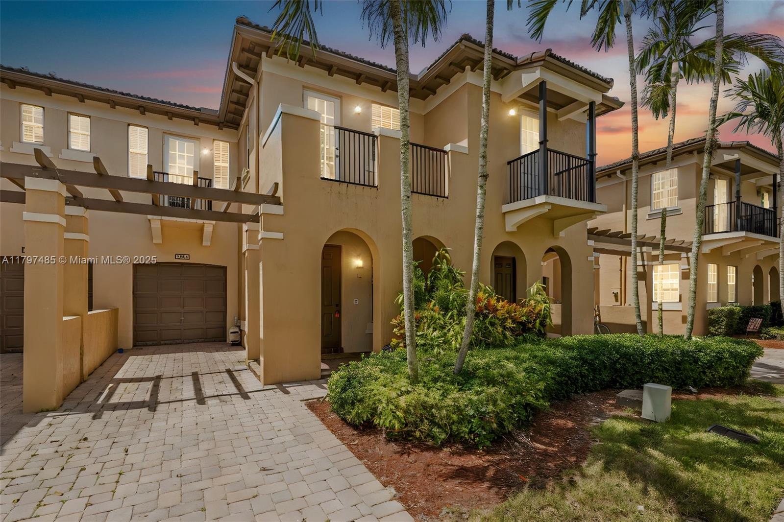 Seller Motivated, Nestled in the heart of Davie, this beautifully upgraded 3-bedroom, 2.5 bathroom townhouse is where comfort meets convenience. Step inside to an inviting kitchen, boasting elegant granite countertops—a perfect space to entertain or enjoy quiet mornings. The warm wood laminate flooring downstairs adds a touch of charm, while the master suite, complete with two spacious walk-in closets, offers a private retreat. Every bedroom features its own balcony, letting in natural light and fresh air. The upstairs laundry room ensures effortless chores, while the one-car garage and driveway space for two more make parking a breeze. Plush carpeting in two of the bedrooms creates a cozy atmosphere, and the backyard patio.