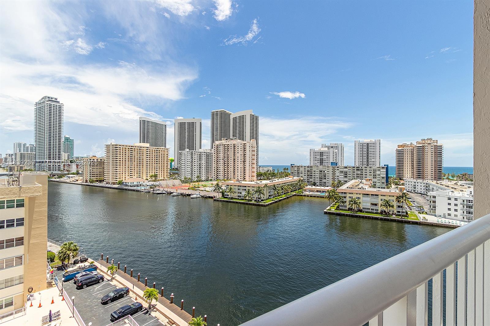 Beautiful 3BR/2BA Condo with spectacular views of the Intercoastal and Ocean at Dorsey Arms! This gorgeous residence has been meticulously maintained and features a bright and spacious open floor plan perfect for entertaining. Ample sized kitchen with tray ceiling, recessed lighting, custom hand cut stone backsplash and new electric range. Oversized master suite with luxury vinyl flooring, walk-in closet and updated bathroom with glass encased shower door. Watch the yachts pass by as you enjoy incredible views of the intercoastal and ocean. Washer/dryer inside the unit. Water and 1 assigned parking space included. Additional parking available. Secured lobby, private pool, clubhouse, game room, gym and onsite management. Walk to the beach, shops, restaurants, supermarkets and more!