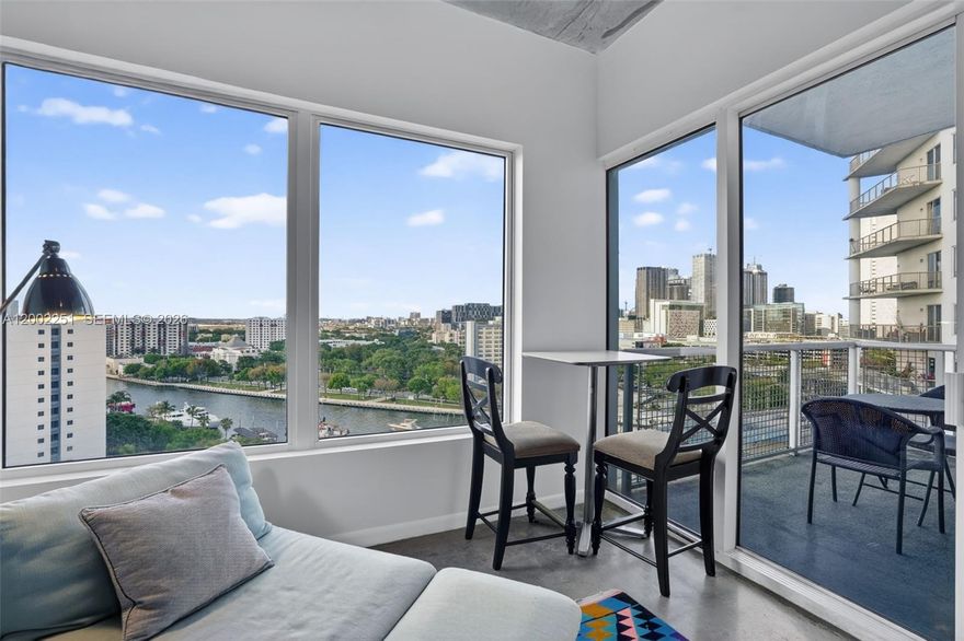 Expansive furnished 1-bedroom in Historic Riverside with north-facing views of the Miami River and skyline. It offers an open layout with polished concrete flooring throughout, a modern kitchen with custom Italian cabinetry and a new refrigerator, as well as a well-maintained bathroom. The bedroom features a queen-size bed and customizable closets for flexible storage. The living area extends to a large semi-private balcony offering views of the iconic Miami River and city. Complete with 1 parking space. Central to Downtown Miami, Little Havana, Coconut Grove, and Brickell City Center with direct access to I-95 (5.6 miles) to airport. Amenities include gym, infinity-edge lap pool, sauna, tennis court, meditation garden, dog park, clubhouse, business center, a resident gourmet Spanish restaurant Jamon Iberico Pata Negra, 24-hour concierge, and valet.