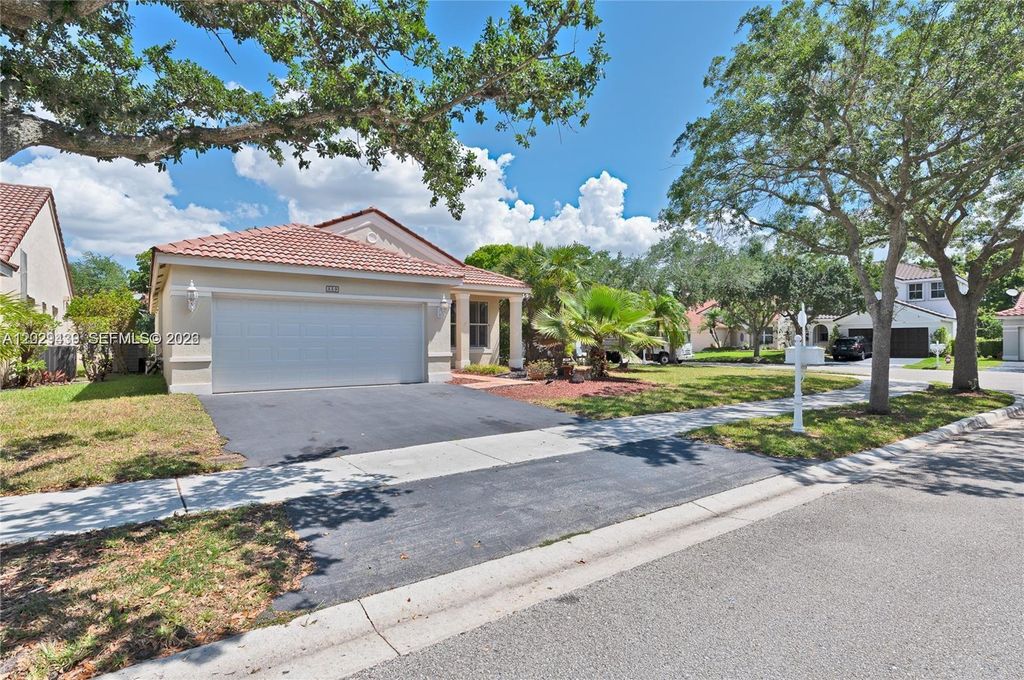 Photo of 889 Sand Creek Cir, Weston, FL 33327 (MLS # A12029439)