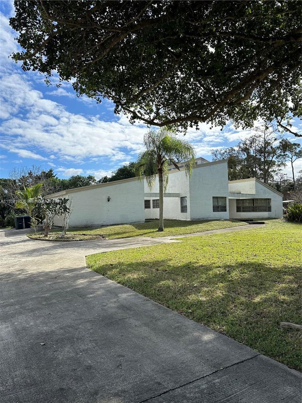 Photo of 6132 NW 79th Way, Parkland, FL 33067 (MLS # A11508192)