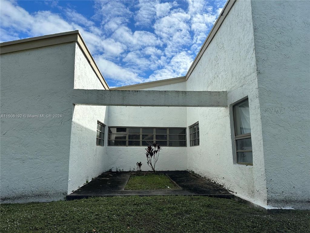 Photo of 6132 NW 79th Way, Parkland, FL 33067 (MLS # A11508192)