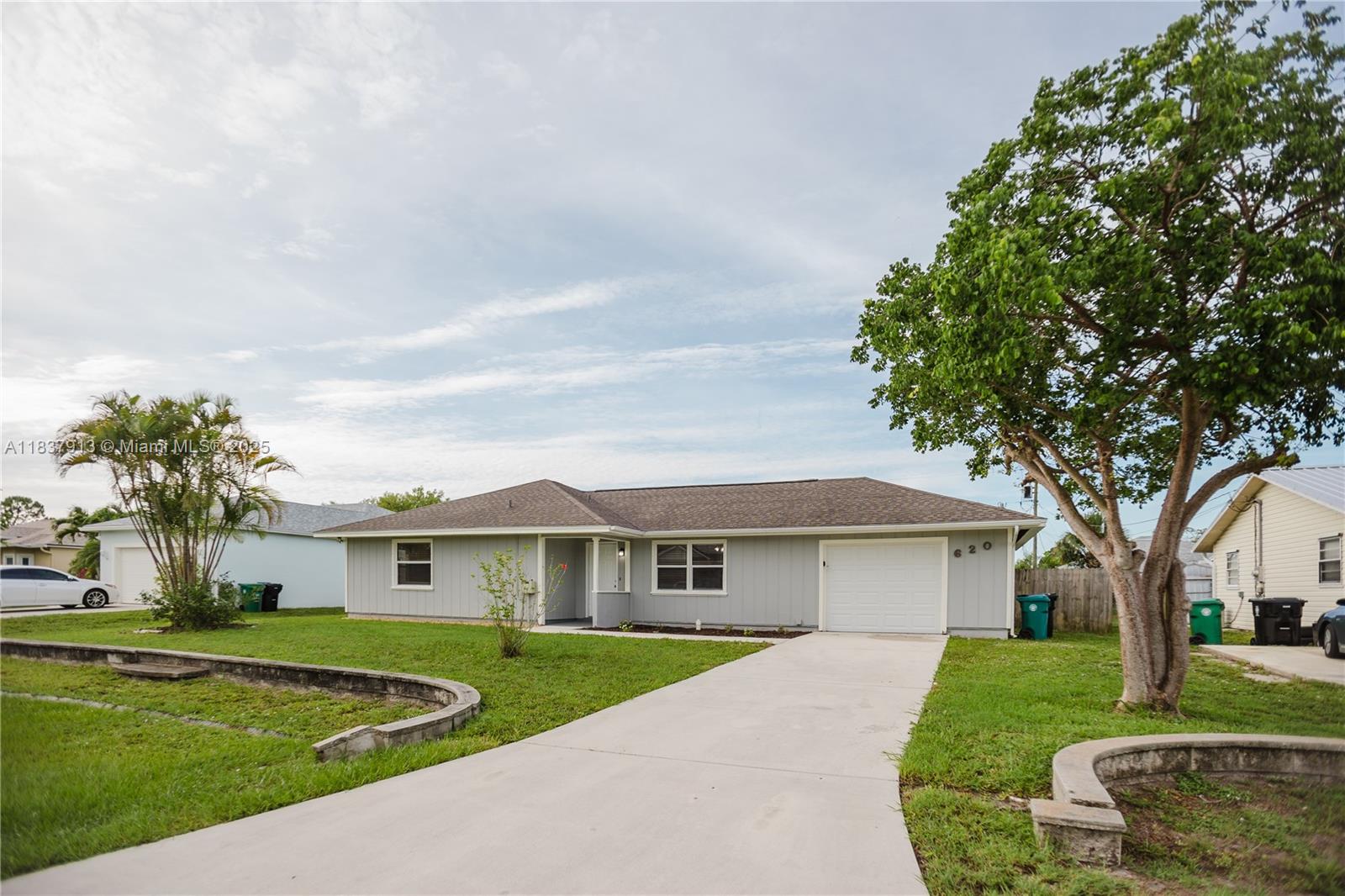 Beautiful 3BR, 2BA home in a desirable Port St. Lucie neighborhood! This move-in ready property features an open floor plan with tile in main areas, spacious living and dining rooms, and a modern kitchen with granite counters, stainless steel appliances, and breakfast bar. The primary suite offers a walk-in closet, dual vanities, soaking tub, and separate shower. Enjoy a private, fenced backyard with covered patio, and a nice pool—perfect for entertaining. Includes a 2-car garage, indoor laundry. Conveniently located near schools, shopping, dining, I-95, and a short drive to the beach. Don’t miss this opportunity!