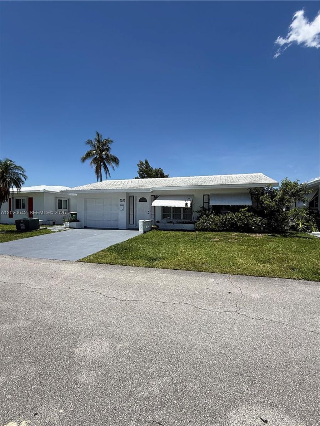 Photo of 8107 NW 58th Pl #8107, Tamarac, FL 33321 (MLS # A12020642)