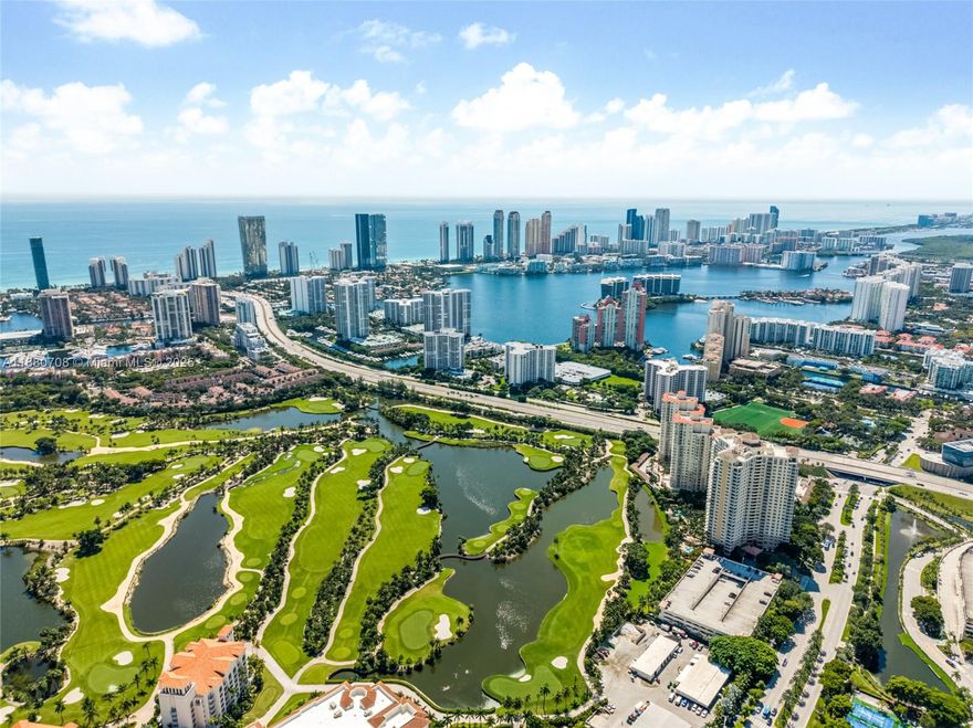 Great location! Gorgeous high-floor residence at Turnberry on the Green with city and sunset views. This light, bright 2-bed/2-bath features an open layout, granite kitchen, and tile flooring throughout. Convenience abounds with a full-size washer/dryer, one assigned parking space & plenty of closets with white wire closet system with shelves and mesh drawers . Turnberry on the Green sits in the heart of Aventura on the famed Turnberry Golf Course- across from Aventura Mall and moments to world-class beaches, dining & entertainment. Enjoy resort-style amenities including concierge & valet, two swimming pools, jacuzzi, a two-story fitness center, sauna, billiards & party room, BBQ area, playground, and more. Unit is being sold unfurnished. Dining room light fixture is excluded from the sale