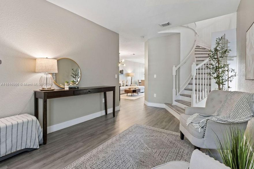 Motivated seller. Remodeled townhouse in the gated community of Milan, offering comfort and convenience. The residence is approximately 2,094 sqft and features 3 bedrooms and 2.5 bathrooms. The home has plantation shutters, blackout window treatments, laminate wood floors and is well-maintained, making it move-in ready. The open-concept kitchen is equipped with stainless steel appliances and seamlessly connects to the living space. Additional highlights include spacious laundry room and one car-garage with storage. The primary bedroom has 2 closets, one being a large walk-in. Refrigerator, dishwasher, washer/dryer were all purchased within the last two years. Property has accordion shutters. Community has a clubhouse, childrens play area, pool and nighttime patrol security.
