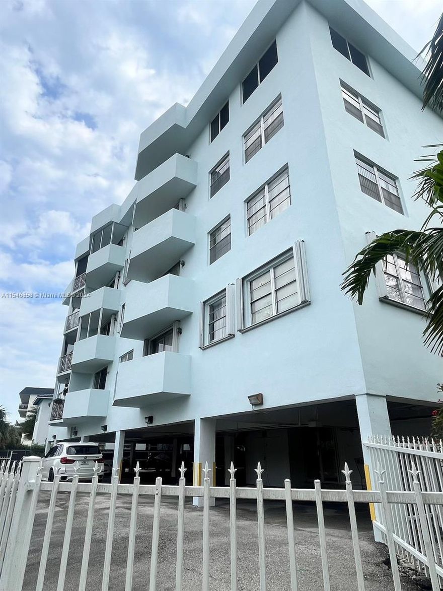 Beautiful top story, corner unit in gorgeous Normandy Isles. This unit has been remodeled and offers 1 bedroom and 1.5 bathrooms. Property has undergone 50 year certification. Provides 1 gated and covered parking space and a balcony that offers neighborhood views, tons of natural sunlight and some water views. Washer and dryer in the unit.  Low HOA.