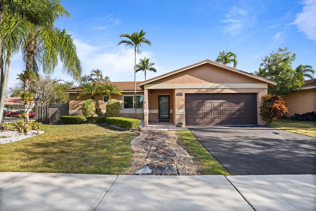 Photo of 16941 Royal Poinciana Dr, Weston, FL 33326 (MLS # A11987816)