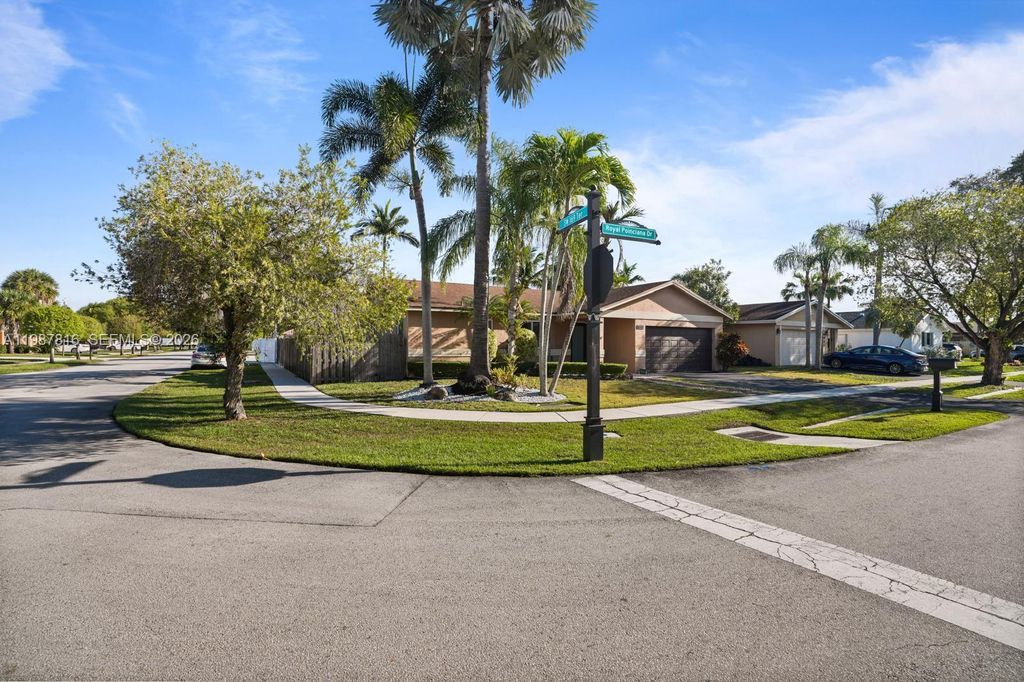 Photo of 16941 Royal Poinciana Dr, Weston, FL 33326 (MLS # A11987816)