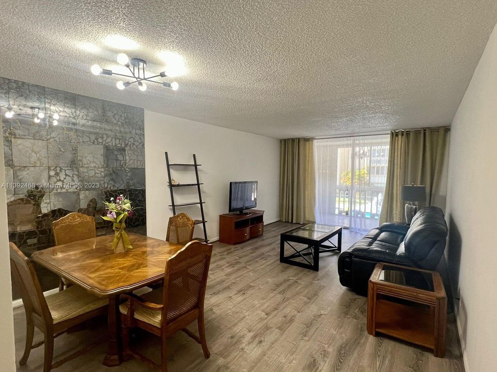 Photo of 301 NE 14th Ave #204, Hallandale Beach, FL 33009 (MLS # A11392468)