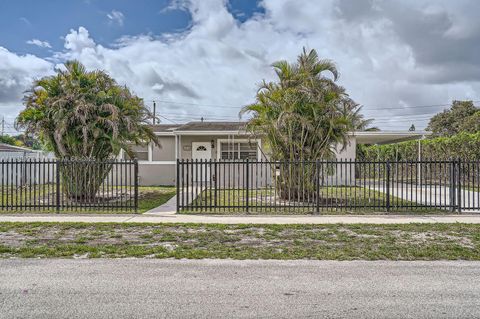 Photo of 2440 NW 208th St, Miami Gardens, FL 33056 (MLS # A11772927)