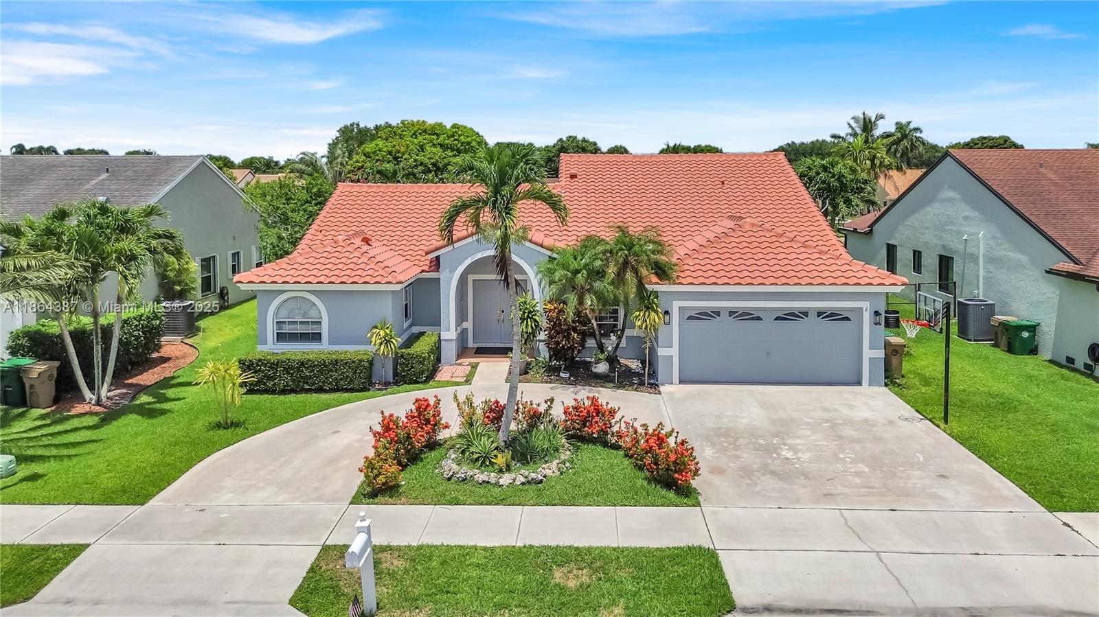 Located in Nob Hill Palms, this 5-bedroom, 2.5-bath home blends comfort, space, and lifestyle. Steps from Indian Ridge Middle and Fox Trail Elementary, with nearby police and fire stations for peace of mind. Quick access to I-595 and SR 84 makes daily routines seamless. Enjoy a peaceful water view, oversized driveway for 7 vehicles, and a kitchen with modern appliances. The A/C is under 5 years old, and the S-tile roof suits hot, sunny climates—its design keeps interiors cooler than many options. Its thermal resistance reduces heat transfer, lowering cooling costs and enhancing comfort. With insulation and cross-ventilation, the home stays pleasant using less energy. Spacious layout offers flexibility for families, remote work, or entertaining. No rental restrictions. Move-in ready!