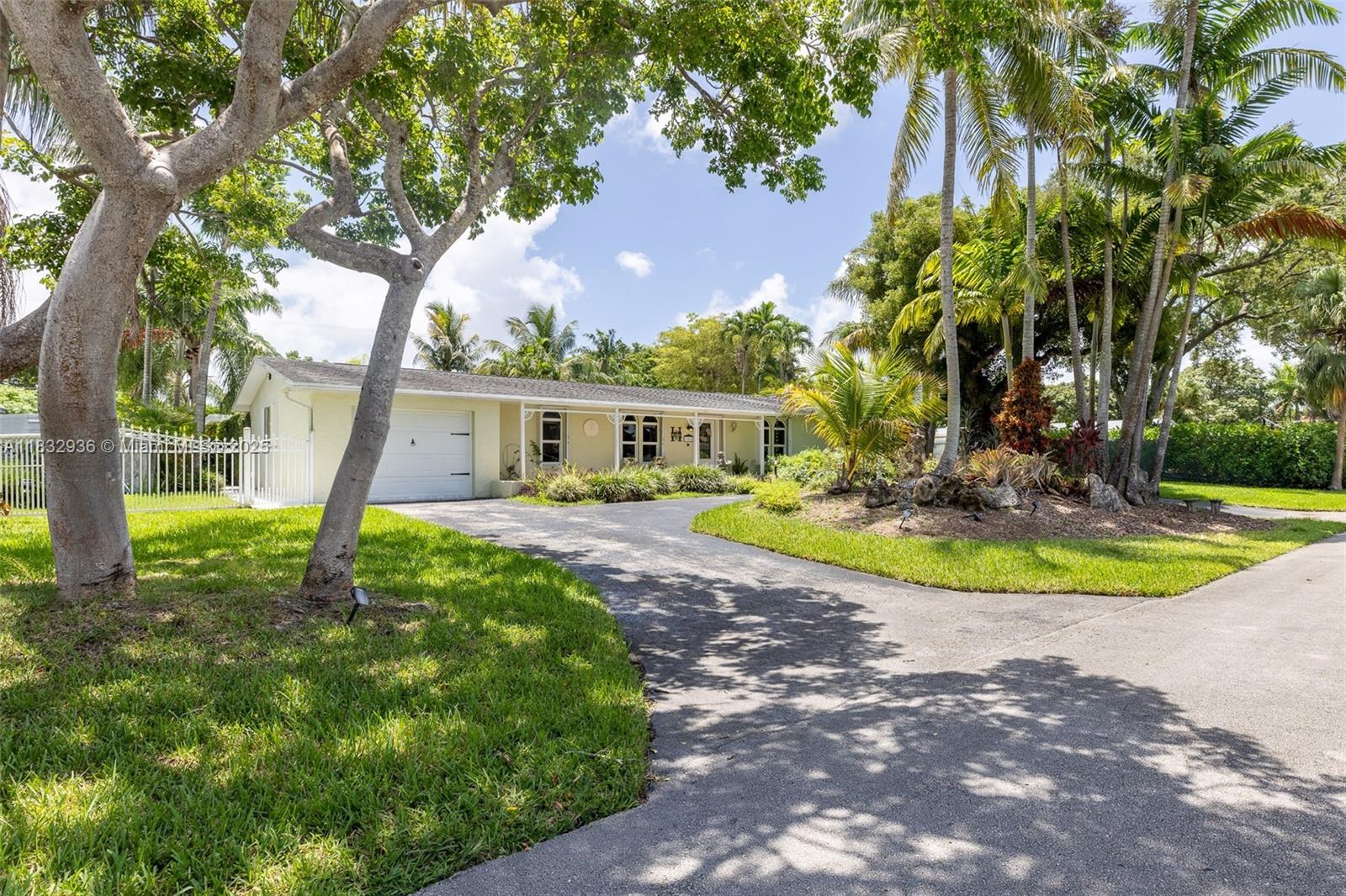 This spacious 2,645 total sq ft home boasts a 4 BD/ 3 BA layout on a sprawling 17,400 sq ft lot. Enjoy the convenience of a main house and a guest house. The guest house offers rental income potential, while the lot provides ample parking for boats, campers, etc. The lush tropical oasis features a pool with new solar heating/cooling system and an aluminum pergola for al fresco dining or relaxation. Inside, discover high impact windows/doors, vinyl plank floors, and a stunning renovated custom kitchen with an expansive cooking island, quartz counters and top-tier Frigidaire/GE appliances. The main suite offers a sitting area and dual closets, and there are 2 private wells for water and sprinklers. Prime location with easy access to major highways and top-rated schools.
