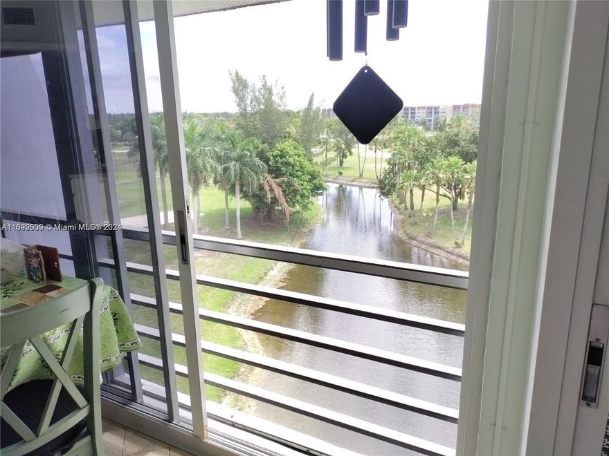 55+ INVESTORS ONLY. Unit has been rented. Bright and light, fully tiled with an amazing water view from an enclosed balcony facing east, split bedrooms, 2 full bath, washer/dryer in unit, Central AC. Hurricane proof sliding doors. Super clean! Well maintained community with lush landscaping, community pool, serene greenery and water views, tucked away from busy roads yet conveniently located to shopping and major roads. Florida resort living at its finest!