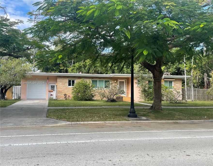 Home is in excellent condition with all brand new Hurricane proof windows and back door.  Huge bedrooms with lots of sunlight. White plantation adjustable wooden shutters throughout the whole house. Large bathrooms with walk in Kohler tub as well as stand up shower with brand new hot water heater. Brand new bathroom vanity. Second bathroom brand new shower and shower heads and new sink/ vanity. Lots of storage in kitchen, foyer, large closets in bedrooms and hallway. Quality and craftsmanship built to last. Central A/C works very well, fairly new. Huge mango tree bearing fruit every year. Washer and dryer not included