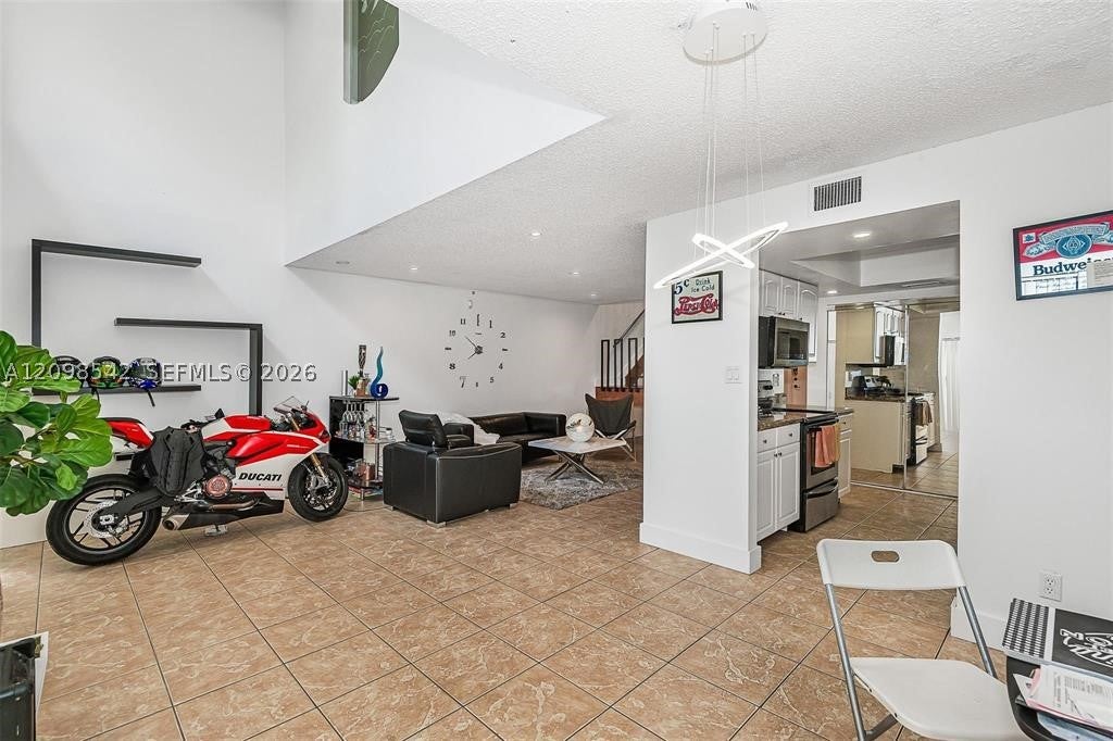 Photo of 9979 W Atlantic Blvd #9979, Coral Springs, FL 33071 (MLS # A12098542)