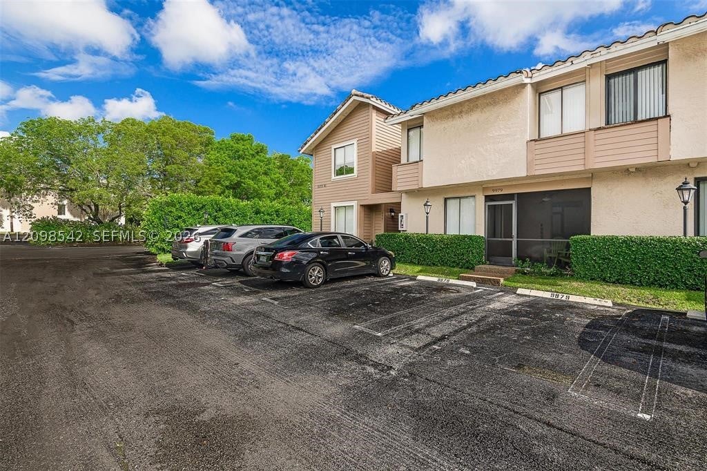 Photo of 9979 W Atlantic Blvd #9979, Coral Springs, FL 33071 (MLS # A12098542)