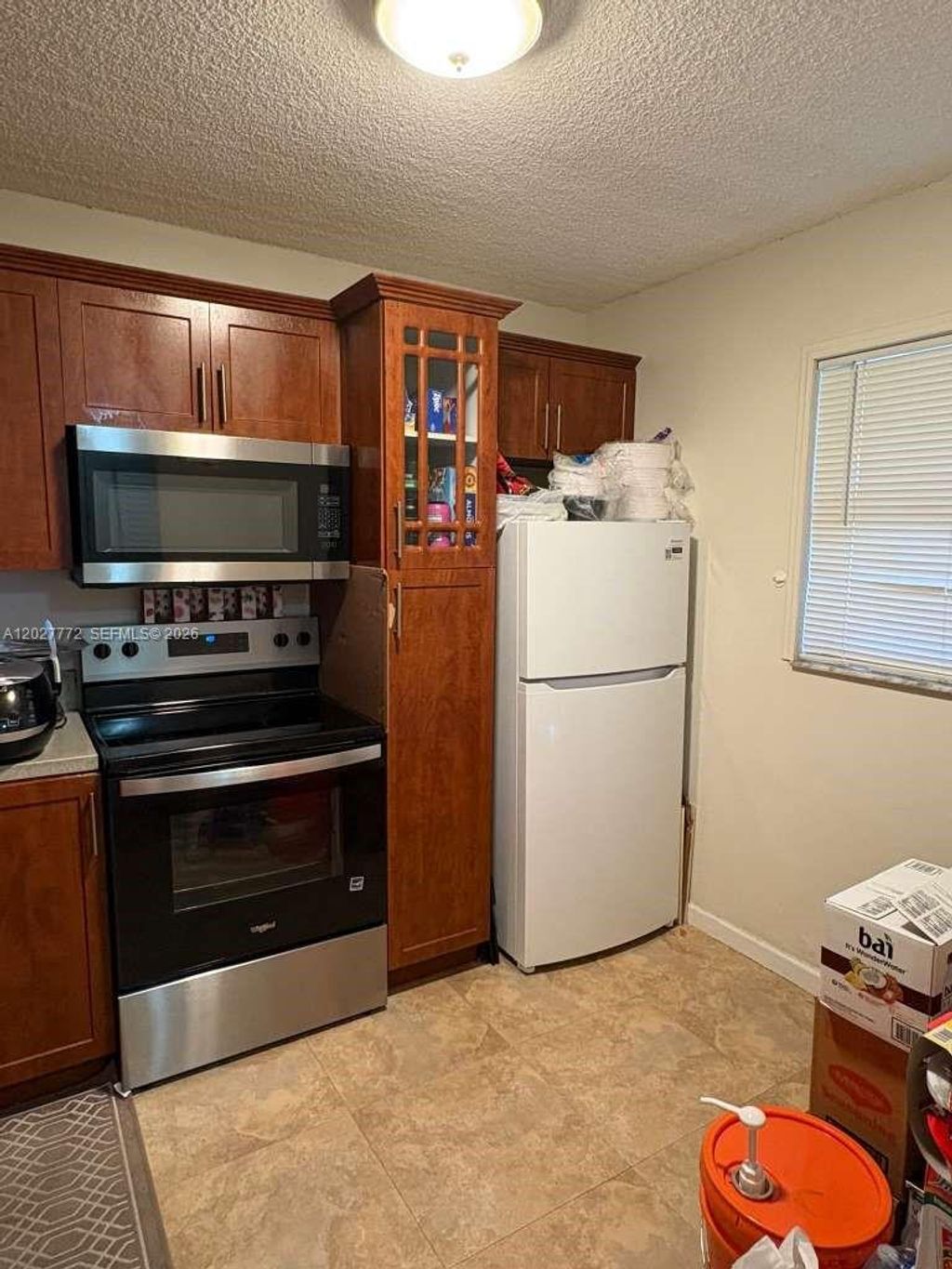 Photo of 9181 NW 1st Ct #101, Pembroke Pines, FL 33024 (MLS # A12027772)
