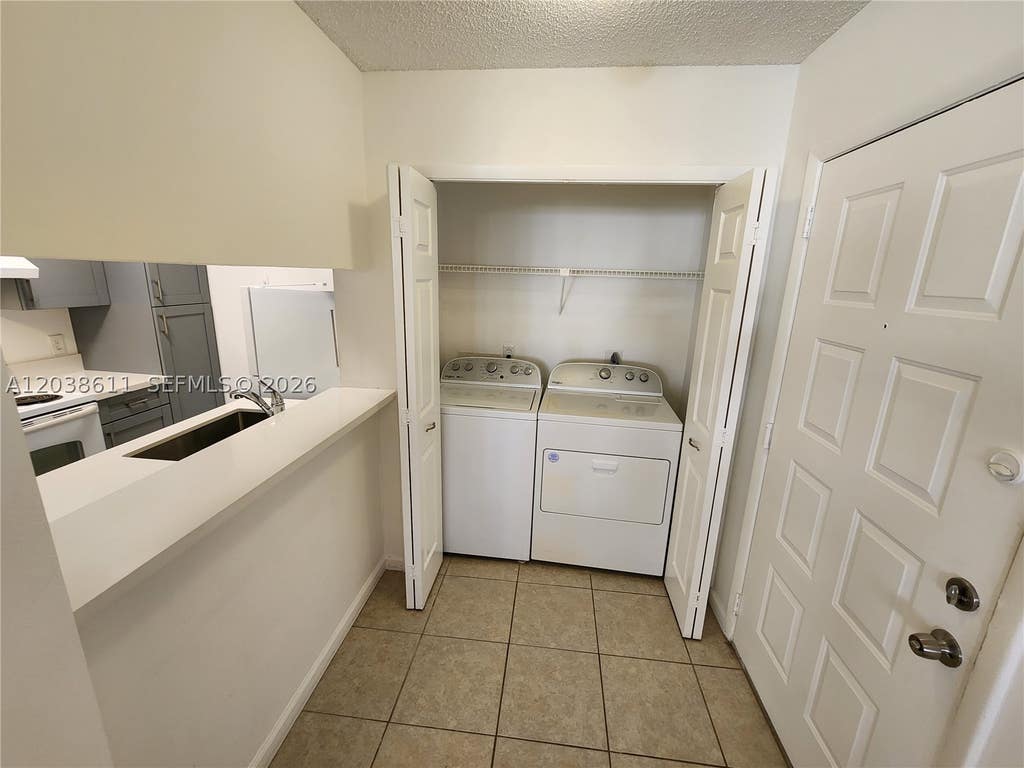 Photo of 4401 W Mcnab Rd #16, Pompano Beach, FL 33069 (MLS # A12038611)