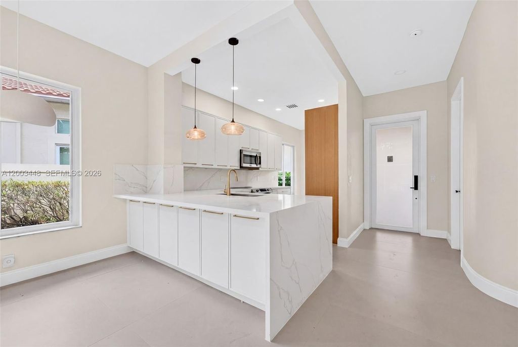 Photo of 2546 NW 52nd St, Boca Raton, FL 33496 (MLS # A12003448)