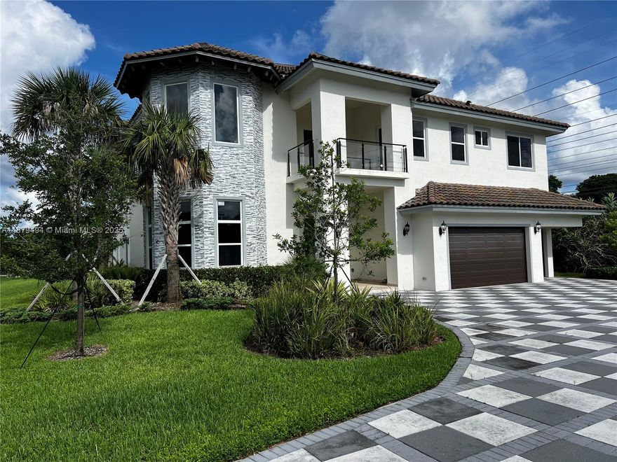 This Estate is breathtaking, rare opportunity to rent this type of luxurious property. No detail is overlooked, high end finishes. Entrance features extra high ceilings; ample floor plan with space to spare. Marble floors on living/dining room, porcelain floors on rest of the house. Kitchen with oversized quartz counter, stand-alone refrigerator/freezer, double-oven, wine cooler, custom made cabinets. Custom closets as well (no hardwire). Travertine floors outdoor areas. In Davie at the end of an exclusive no-outlet street of just 8 homes. Total construction area of 7493sf of which 825sf is a 3 car garage. In addition, driveway has space for several cars. Close to Broward College and Nova Univ, minutes from Hard Rock Hotel. Quick access to Turnpike and most major streets or highways