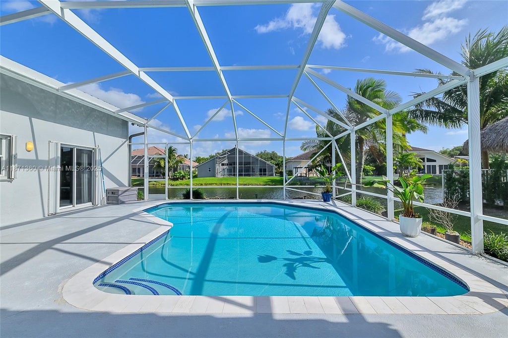Photo of 9912 NW 49th Pl, Coral Springs, FL 33076 (MLS # A11871360)