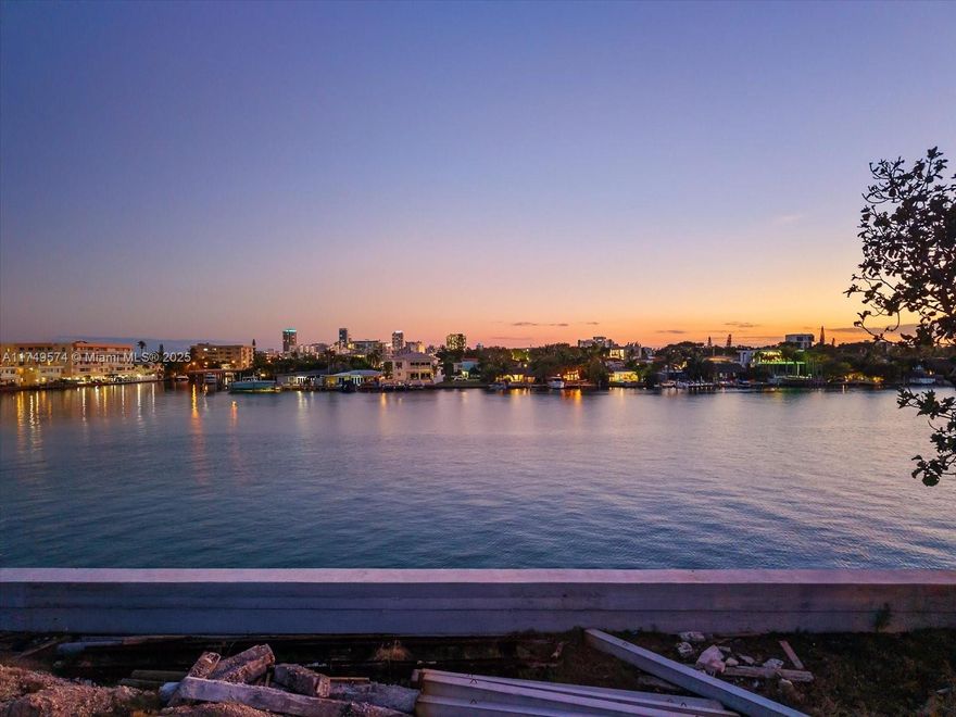 An extraordinary opportunity to create your dream waterfront estate in the exclusive Surfside community. This double lot spans 30,000 SF with 150 of prime waterfrontage, offering the ideal canvas for a bespoke masterpiece. Approved plans by Thirlwall and 3D Design feature a 9,600+ SF luxury residence designed to showcase sweeping water views and embody refined coastal living are fully permitted and shovel ready. Located moments from Surfside beaches, Bal Harbour Shops, and close proximity to places of worship and top-rated public and private schools, this location offers tranquility and accessibility. Walking distance to Four Seasons Surfside which offers beach club membership. New seawall has been recently completed.