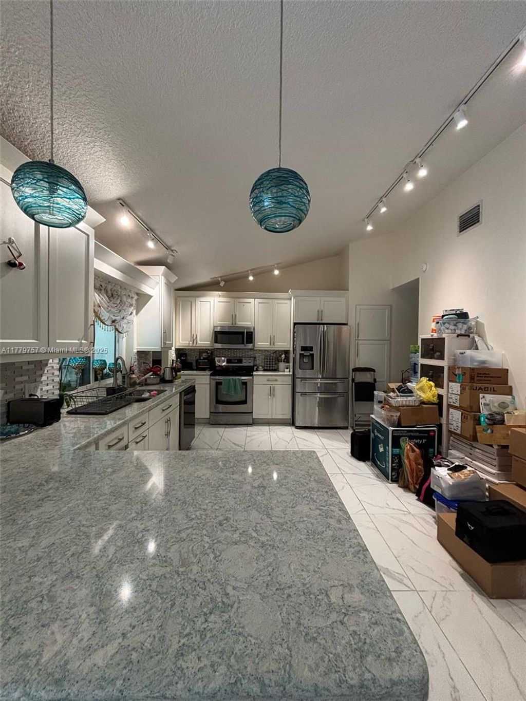 Photo of 3930 NW 72nd Dr, Coral Springs, FL 33065 (MLS # A11779757)