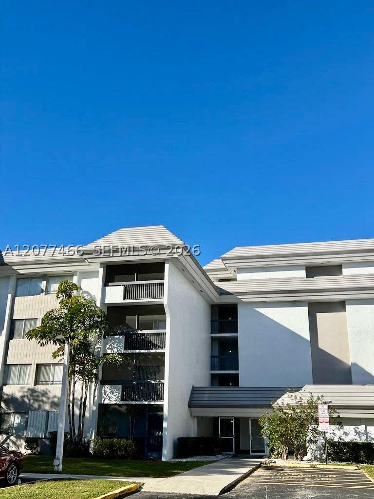 Photo of 721 N Pine Island Rd #213, Plantation, FL 33324 (MLS # A12077466)
