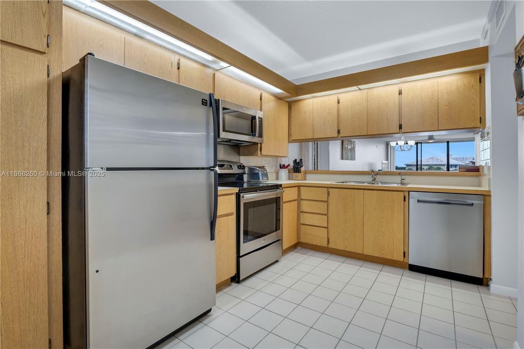 Photo of 2441 S Village Blvd #402, West Palm Beach, FL 33409 (MLS # A11868260)