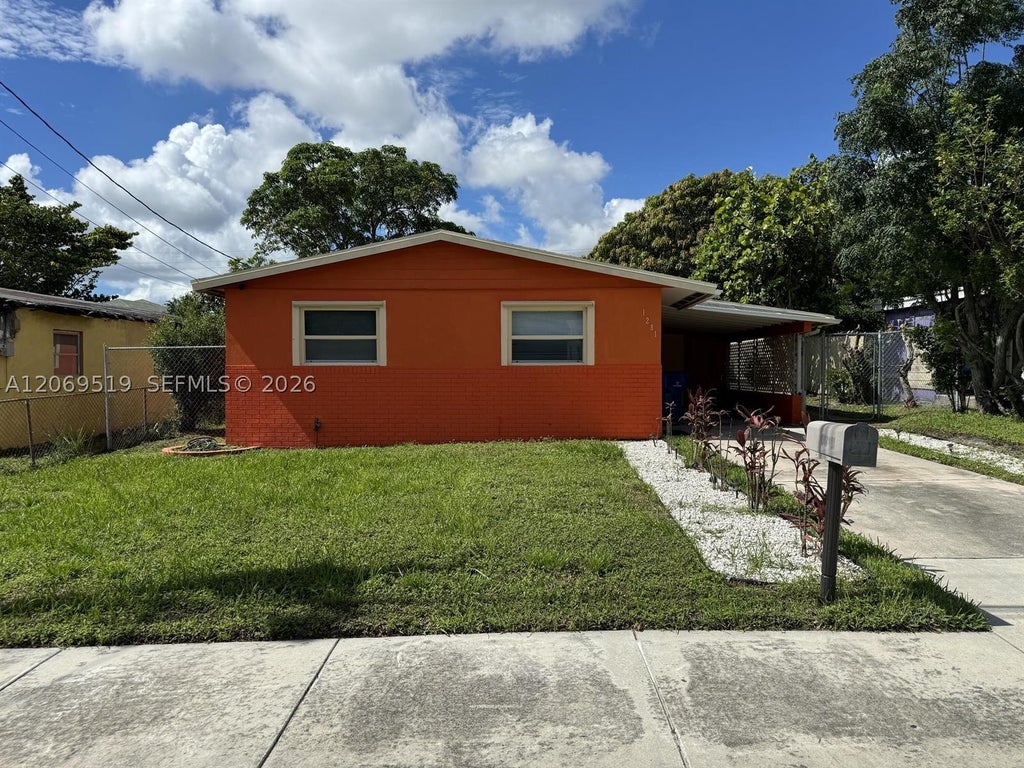 Photo of 1281 W 35th St, Riviera Beach, FL 33404 (MLS # A12069519)