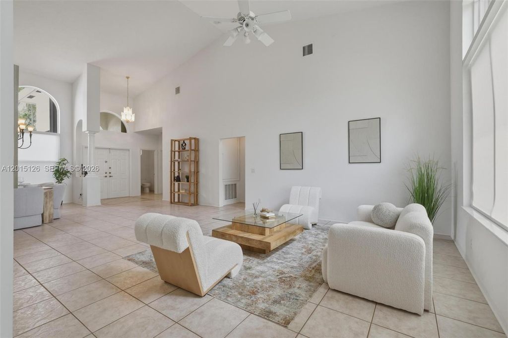 Photo of 2099 NW 126th Ave, Pembroke Pines, FL 33028 (MLS # A12015126)