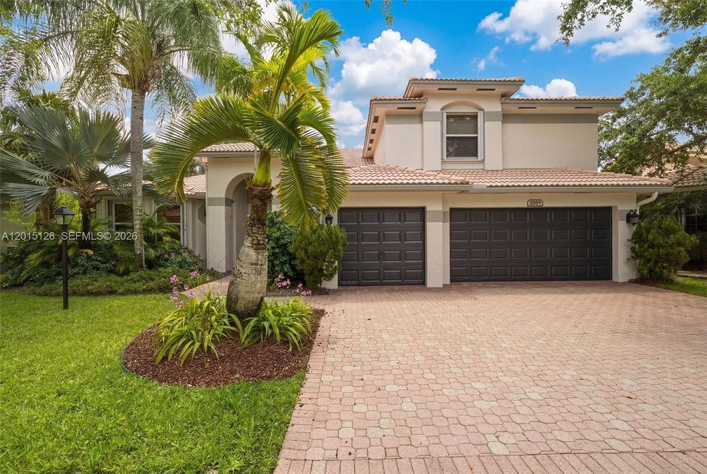 Photo of 2099 NW 126th Ave, Pembroke Pines, FL 33028 (MLS # A12015126)