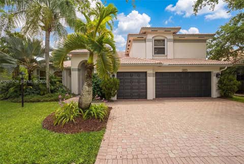 Photo of 2099 NW 126th Ave, Pembroke Pines, FL 33028 (MLS # A12015126)