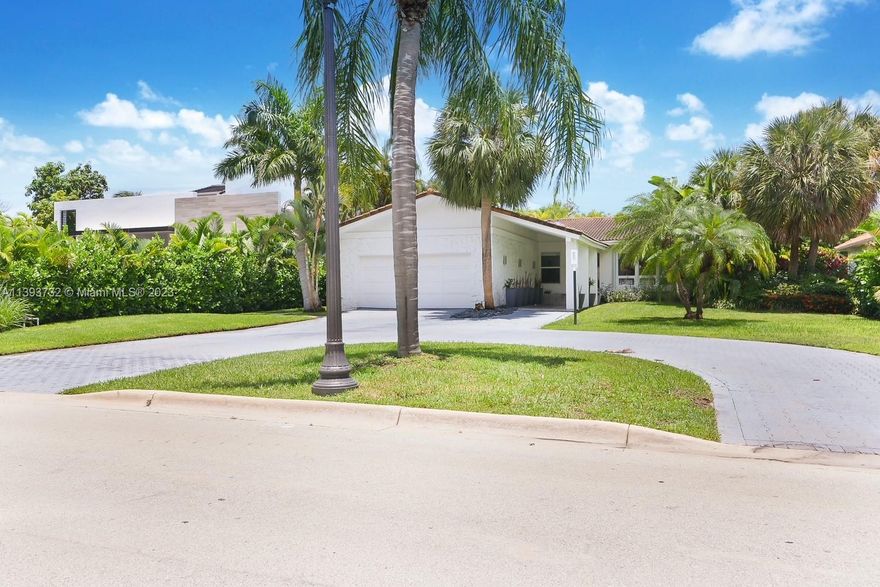 GOLDEN BEACH-GATED COMMUNITY-PRIVATE BEACH. Recently renovated 1-story home with 5 bedrooms, 4 baths + bonus office. Open floor plan with porcelain floors throughout. Sleek white kitchen with stainless steel appliances and quartz countertops, vaulted ceilings in the living area with French doors opening to an oversized backyard/pool area. Spacious master suite with his and hers closets. Move into this cozy ranch or build your dream home on this oversized 13,650 sf lot. Plans for a tropical modern 6,800 sf, 6 bd/7bth home available. Great location within walking distance to Tweedle Park.