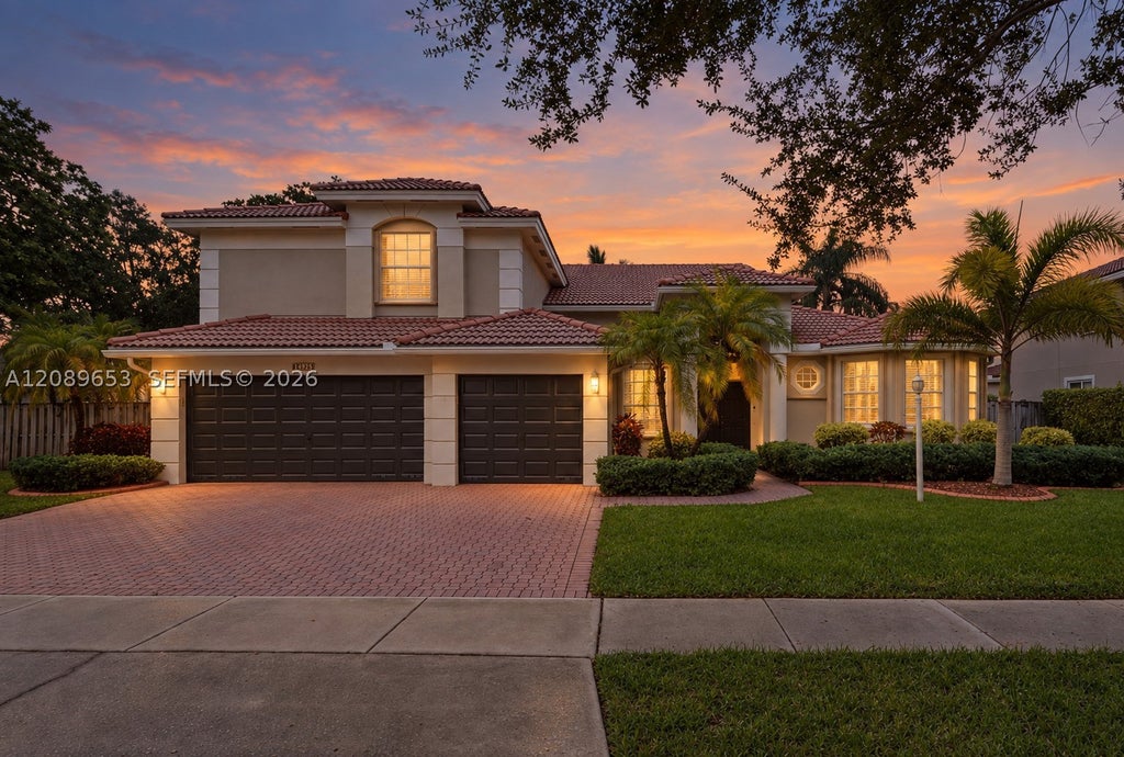 Photo of 13875 NW 20th St, Pembroke Pines, FL 33028 (MLS # A12089653)