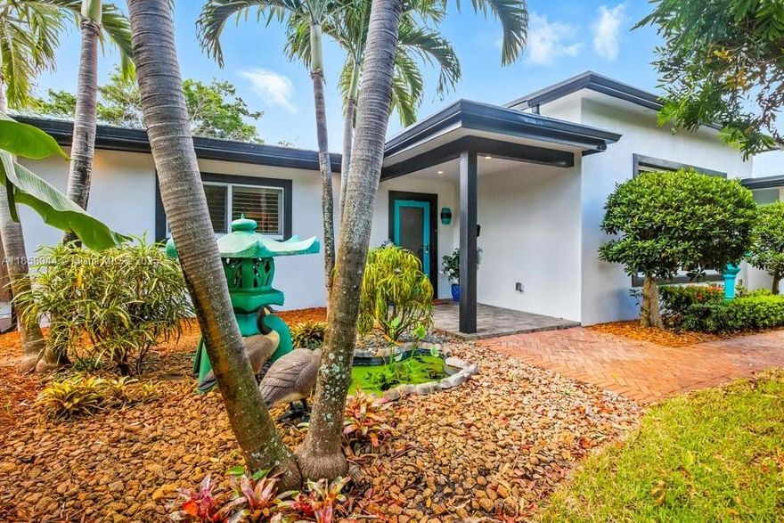 This fully renovated 3-bedroom, 3-bathroom home is a rare blend of character, modern upgrades, and space. Step inside to an open floor plan with high ceilings, where a spacious living room flows seamlessly into the updated kitchen—ideal for entertaining. The thoughtful layout includes three large bedrooms, two of which are en-suites, offering ultimate privacy and comfort. Outside, discover your private oasis with a saltwater pool, screened-in porch, and koi pond. Additional amenities include a dedicated barroom, impact doors & windows, garage, and an irrigation system on a private well. Tucked in a serene neighborhood, this home's prime location offers convenient access to Federal Highway, is a golf cart ride to the beach, and is zoned for  Floranada Elementary School.