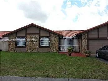 20118 Nw 58th Pl, Hialeah, Miami-Dade County, Florida - 4 Bedrooms  
2 Bathrooms - 