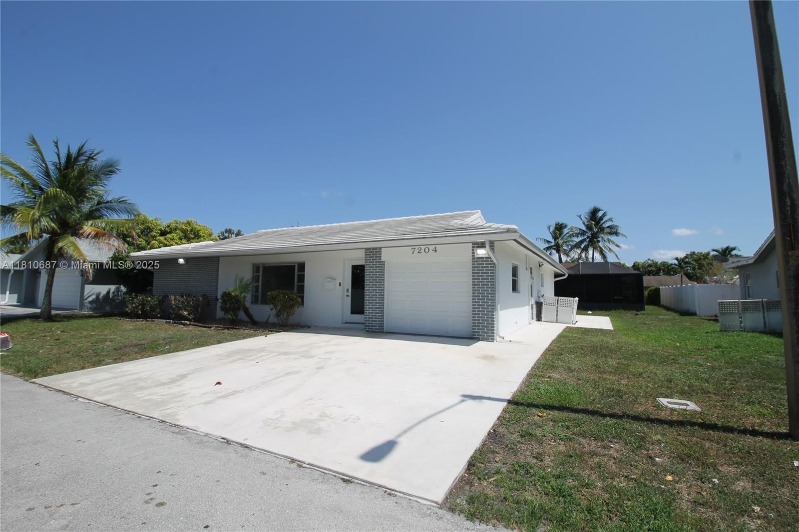 Property for Sale at 7204 Nw 76th Dr, Tamarac, Broward County, Florida - Bedrooms: 2 
Bathrooms: 2  - $425,000