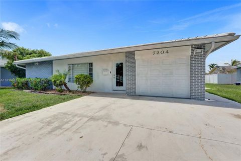 Photo of 7204 NW 76th Dr, Tamarac, FL 33321 (MLS # A11810687)