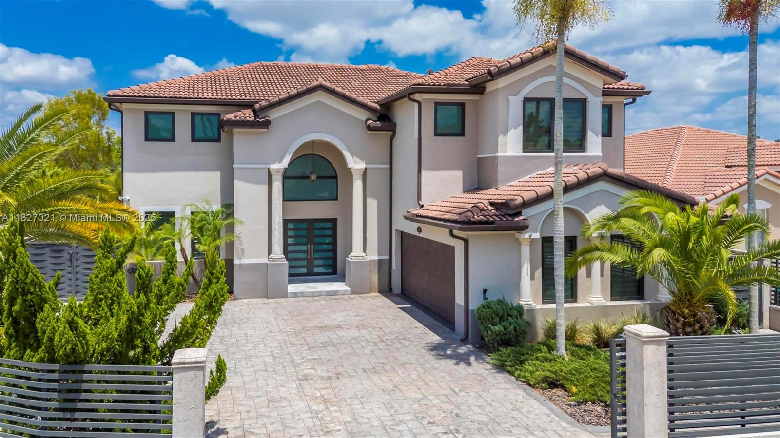 This beautifully remodeled 5-bedroom, 4-bathroom corner lot is the perfect fusion of luxury and modern elegance. From oversized marble floors to contemporary chandeliers and a sleek, brand-new kitchen, every element has been thoughtfully curated. Glass stair rails open up both sides of the home, highlighting the spacious and open layout. Each generously sized bedroom is complemented by zebra blinds and fully updated bathrooms. The luxurious primary suite boasts a spa-inspired ensuite featuring a jacuzzi tub, double vanity, and walk-in closets. Hurricane impact windows ensure security and peace of mind. Step outside to your private retreat—complete with a saltwater heated pool, elegant marble pavers, a BBQ area, and a gazebo—ideal for entertaining guests. No HOA!