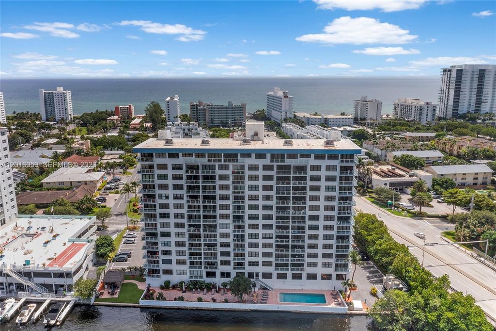 Photo of 1401 N Riverside Dr #1406, Pompano Beach, FL 33062 (MLS # A12016059)