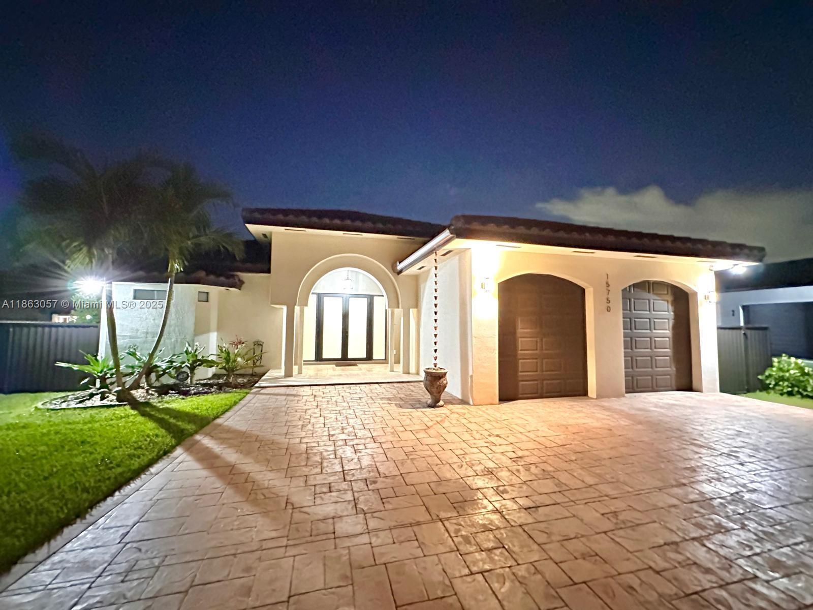 Modern 5BR/3.5BA one-story home for rent in Palmetto Bay, built in 2017. Features include high ceilings, impact windows, 8-ft doors, LED lighting, and a gourmet kitchen with quartz/granite counters and stainless steel appliances. The spacious primary suite offers a large walk-in closet and luxury bath with rain shower, jet Jacuzzi, and double vanity. Enjoy a SMART salt-water pool with sun deck and waterfall, plus a covered terrace and patio. Two-car garage and circular driveway. Pool, garden, and alarm service included. Great location near schools, parks, and shopping. Easy to show.