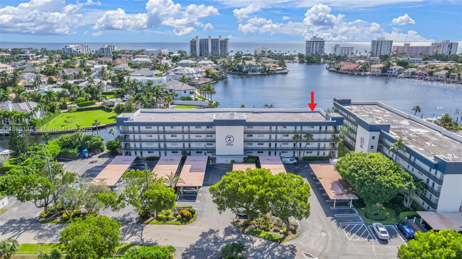 THE 2025/2026 SEASON HAS BEGUN. DO NOT MISS THE OPPORTUNITY TO ESCAPE THE WINTER AND ENJOY RESORT LIVING IN TROPIC HARBOR OF EAST DELRAY BEACH. A FULLY UPGRADED TWO BEDROOM/TWO FULL BATH LUXURY SECOND FLOOR CONDO IS A MUST LIVE IN. THE MOST AMAZING LONG WATER VIEWS FROM YOUR HUGE SCREENED IN PATIO WITH MULTI-MILLION DOLLAR HOMES IN SIGHT. PROFESSIONALLY DESIGNED AND DECORATED WITH A TOUCH OF BEACH/SAND DECOR. GORGEOUS CHEFS KITCHEN, CUSTOM CABINTRY AND COUNTERS AS WELL AS YWO FABULOUS BATHROOMS. TONS OF CLOSET SPACE. BRAND NEW A/C. LIGHT, BRIGHT WITH WOOD PLANK FLOORING. COMMUNITY FEATURES TWO POOLS, SUNDECK, BARBECUES, GYM, LIBRARY AND CLUBHOUSE. JUST MINUTES TO DINING, SHOPPING, DOWNTOWN ATLANTIC AVENUE, BEACHES AND I-95. COVERED PARKING SPACE. NO BETTER WATER VIEWS IN THE COMMUNITY!