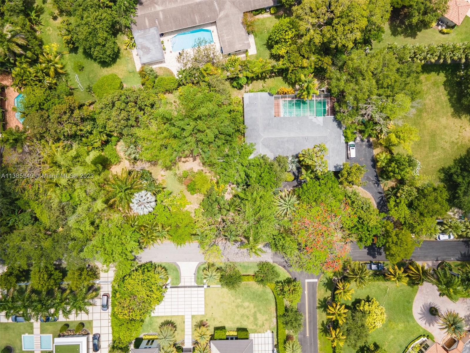 Nestled in the heart of highly desirable Northeast Pinecrest, this unique, 4/3 home is a hidden gem, offering an exclusive sanctuary of peace and tranquility. The rare acre property is a tropical paradise, adorned with an array of exotic palms, an abundance of fruitful trees, and expanses of Zen bamboo, creating a serene and harmonious environment. The house's spacious interiors are perfect for those who appreciate comfort, while the outdoor space provides ample room for leisure and entertainment. The property's location is coveted due to its proximity to Pinecrest Elem, an outstanding public school renowned for its excellent academics. This home presents a truly unique opportunity to enjoy an private lifestyle in one of Pinecrest's most sought-after neighborhoods.